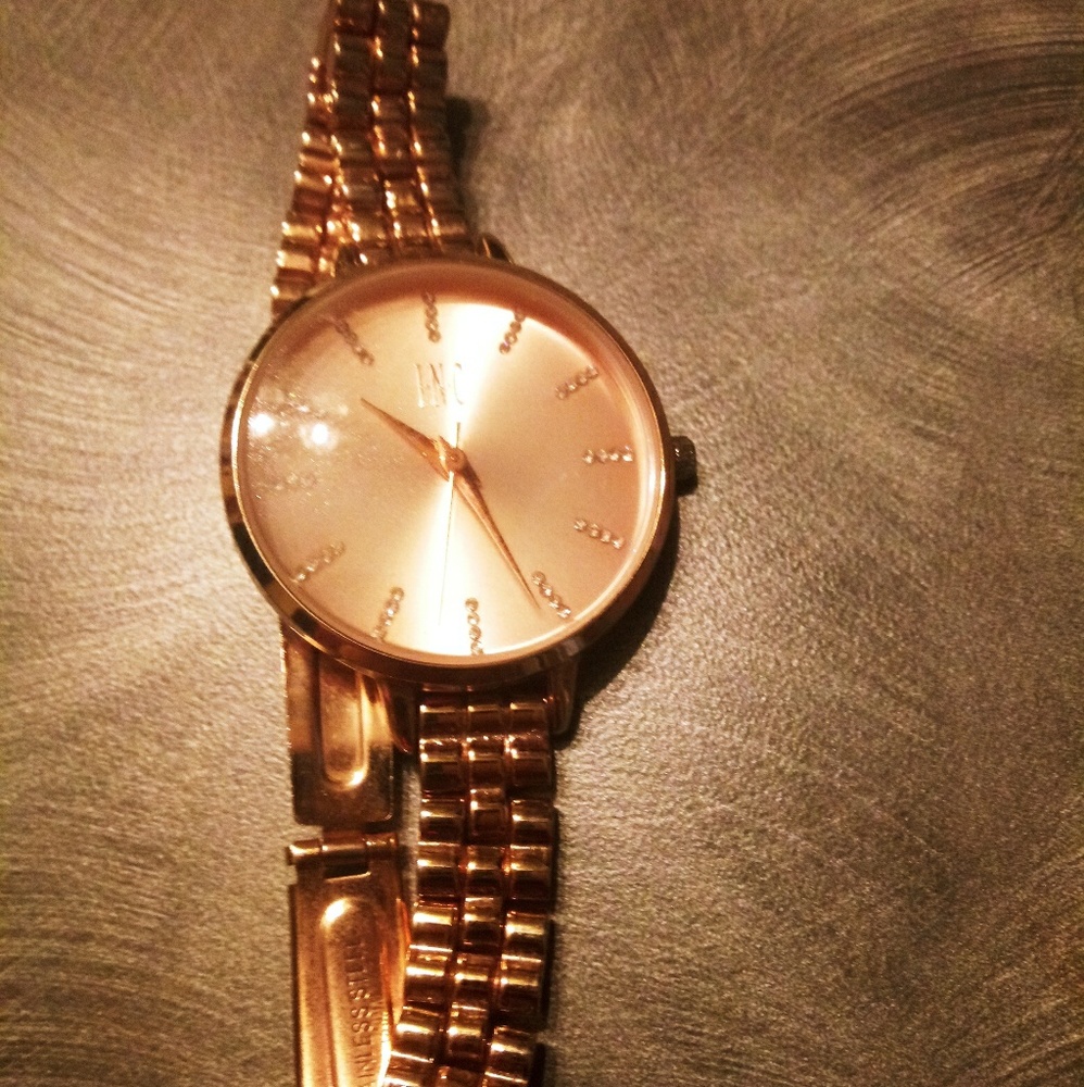 Inc concept rose gold watch